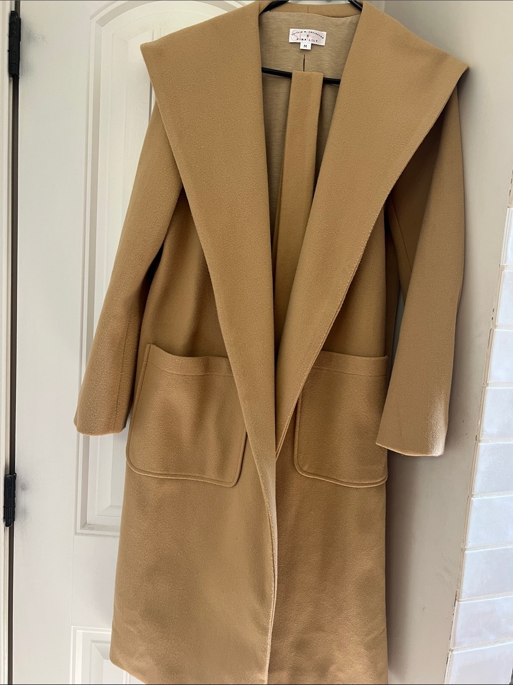 Pink Lily size medium women’s pea coat.